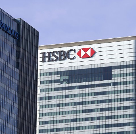 Чистая прибыль HSBC за прошлый год упала более чем на треть